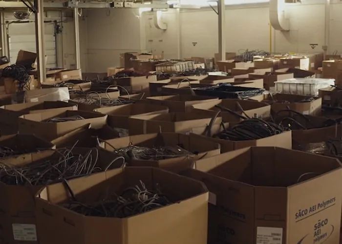 A warehouse full of unprocessed scrap materials before being run through a SWEED non-ferrous recycling system